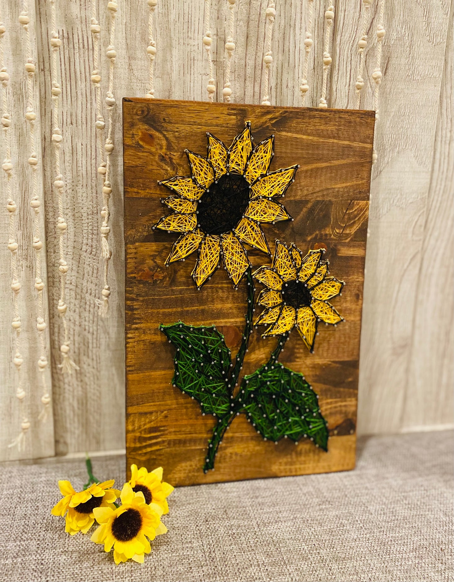 Two sunflowers string art